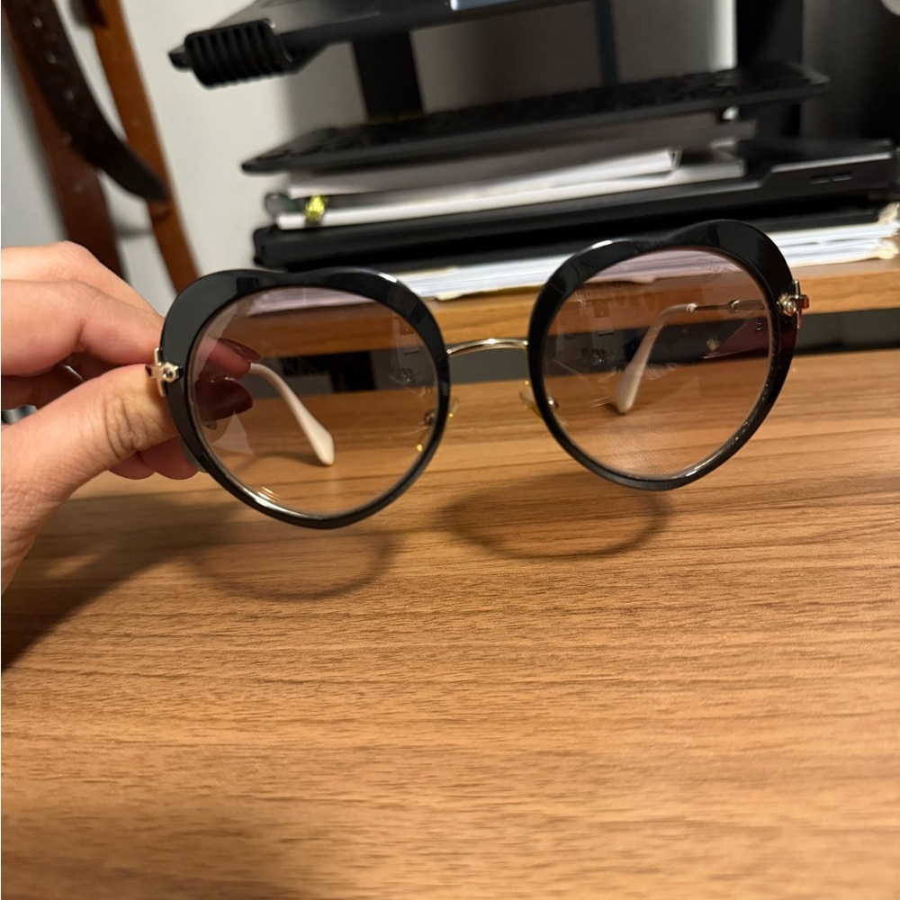 Miu Miu heart shaped sunglass